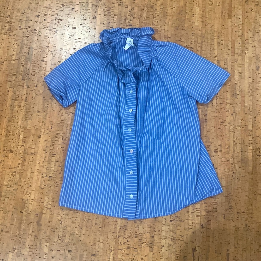 Beautiful blouse with ruffle details